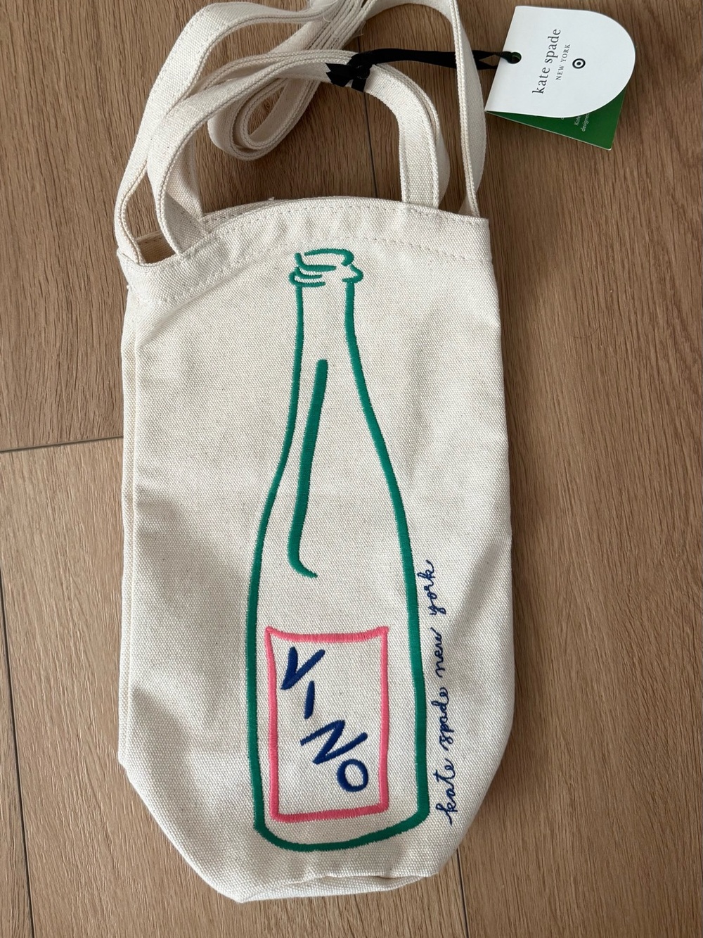 kate spade cream Canvas Tote with Green Bottle Illustration